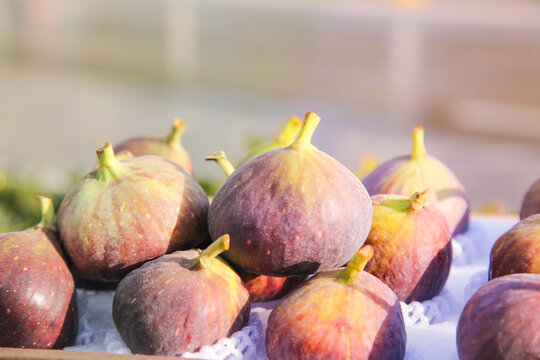 Fresh Ripe Figs with Red Purple Skin at Local Market Display