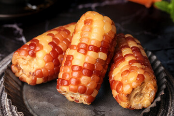 Sweet Glutinous Jade Corn from Yunnan Northeast China - Colorful Traditional Asian Food Specialty on Rustic Wooden Plate © CanVan