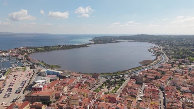 Aerial View Of Carloforte And Salt Flats By The Mediterranean Sea in Sardinia, Italy.