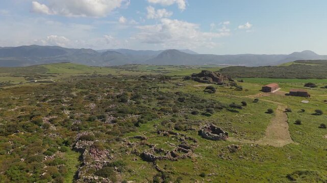 Flying Over the Archaeological Site of the Nuragic Settlement of Seruci In Sardinia, Italy. - aerial shot