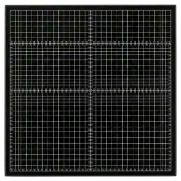 Black cutting mat with white measurement grid isolated over transparent background