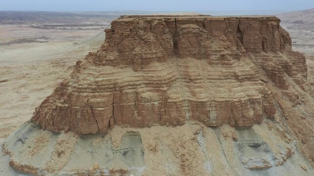 Aerial view of the rugged limestone cliffs of Mount Zin in the Negev desert near Yeruham, South District, Israel.