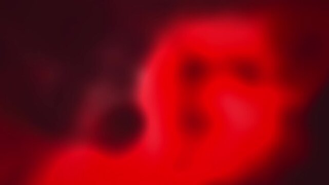 Abstract red light leak background, blurry crimson glow motion, soft ruby bokeh texture for cinematic video overlays