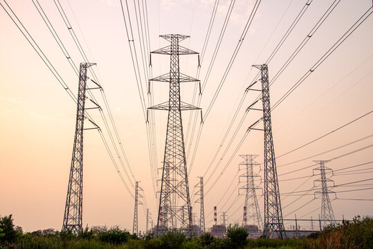 high voltage pole on sky sunset background.