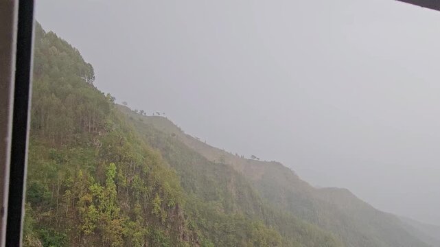 Manakamana Cable Car Descending Over Mountain Valley in Nepal