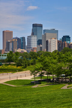 Skyline view of downdown Minneapolis as a vibrant vertical daytime shot on a summer day