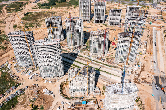 complex of high-rise apartment buildings under construction. residential area development. aerial view.