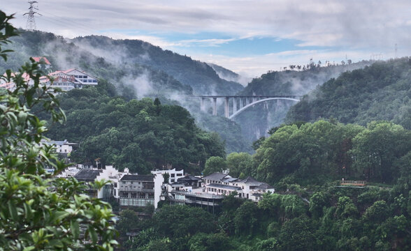 Xiling Gorge: Misty Mountains and Bridge After Rain