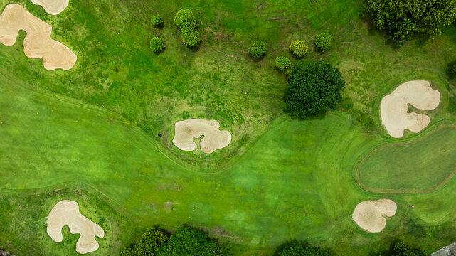 Luxury golf course resort. High view golf course. Green mountain golf course.