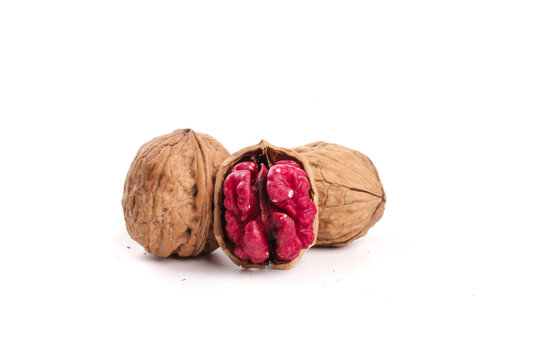 Xinjiang Walnuts with Red Kernel Meat on White Background - Fresh Nuts Display