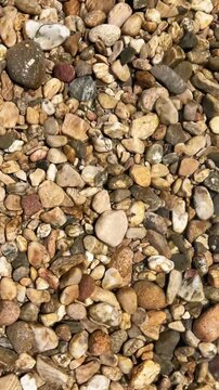 top view full frame background of natural river pebbles and stones