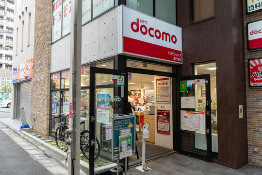 SUGINAMI-KU, TOKYO, JAPAN - AUGUST 15, 2026: Exterior view of Docomo Shop mobile telecom retail store near Koenji Station in Suginami-ku, Tokyo.