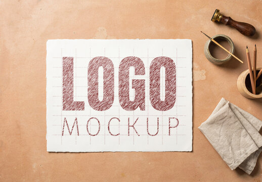 Handmade Paper Logo Mockup on Artisan Workspace