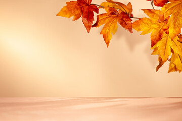 Fototapeta premium Empty wooden surface with orange autumn leaves overhead for minimal seasonal product mockup background