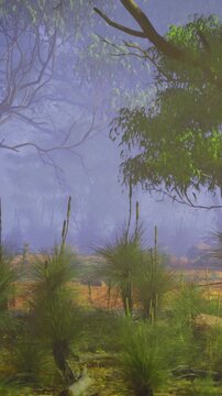 Early morning brings a gentle mist that shrouds the vibrant green plants and trees. Nature awakens quietly, creating an atmosphere of peaceful solitude in this beautiful setting.