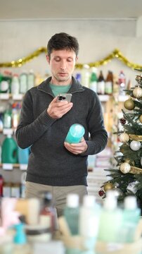 On Christmas Eve, man by scanning QR code, gains access to information shampoo or shower gel. Customer receive additional information about use for problem allergy sufferers. 