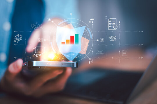 A data analyst uses mobile analytics to evaluate performance metrics, growth trends, KPI reporting, data visualization, strategic planning, productivity, digital transformation for informed decisions