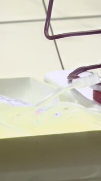 Blood donors. Women giving blood for medical charity program - Vertical Video