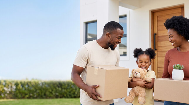 Happy African American family holding moving boxes outside new house, excited parents with daughter carrying belongings and teddy bear relocating to bought property website banner