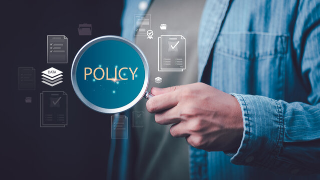 Compliance officer reviews corporate policy, regulatory compliance, document management, governance, risk assessment, internal audit, quality assurance, business standards for organizational integrity