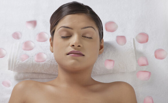 Close-up of woman on spa table 