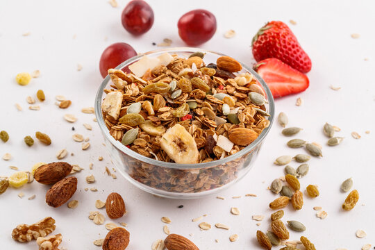 Homemade fruit, nut, and oat mixture was spread out on the table.