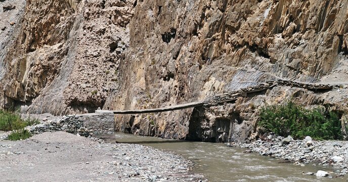 A small bridge across the mountain river Markha,Ladakh,India