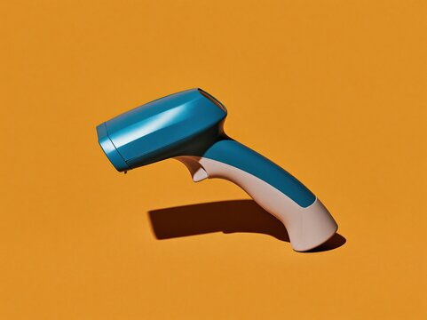 Handheld barcode scanner with a textured grip and metallic blue finish, isolated on a vibrant orange background for retail technology and sales banners