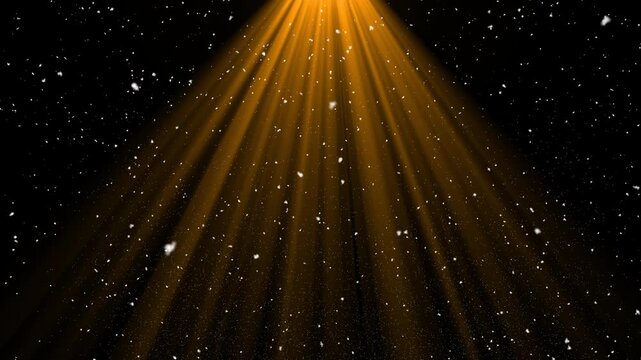Golden Orange Spotlight Rays Beam Down with Falling Snowflakes on Black Background