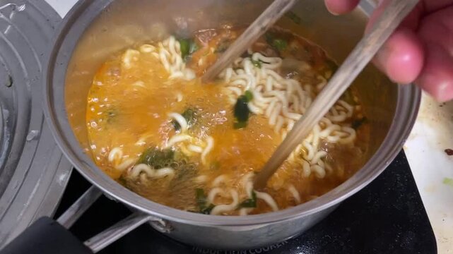 Cooking Korean Spicy Seafood Instant Noodles in a Pot
