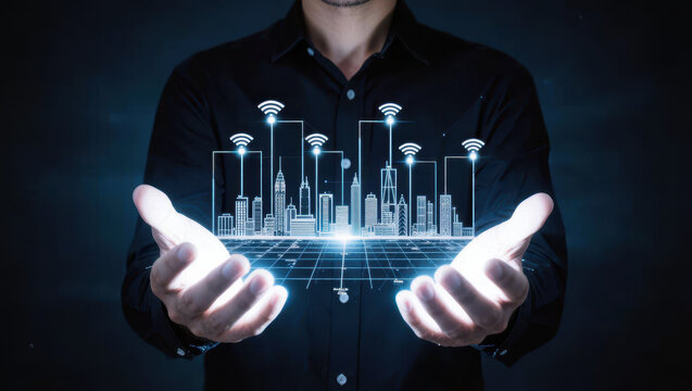 Wireless network smart city digital technology urban skyline businessperson holding glowing connected city concept