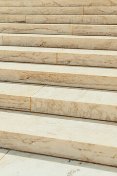 Marble steps create a minimalist architectural pattern.