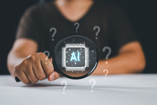 AI question analysis and artificial intelligence research concept. Person using laptop with magnifying glass, AI chip and question marks showing data discovery, problem solving, smart decision support