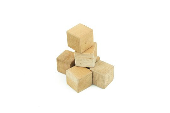 Stack of wooden cube blocks isolated on white background