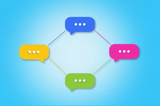 Connected speech bubbles represent a diverse communication network