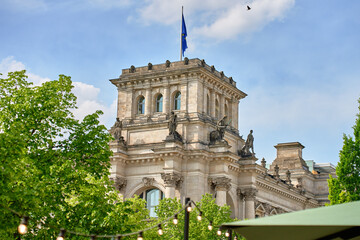 Fototapeta premium Reichstag Building with European Union Flag in Berlin