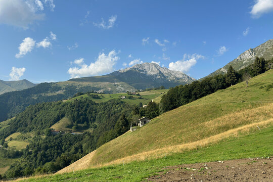 Beautiful View of Mount Arera from a Meadow in the Zambla Alta Mountain Village during a Sunny Summer Day. Italian Alps. Oltre il Colle, Bergamo Province, Italy