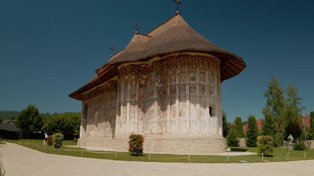 Discover Humor Monastery in Bucovina, Romania. Observe the unique old paintings and learn about the history of this remarkable place during your visit.