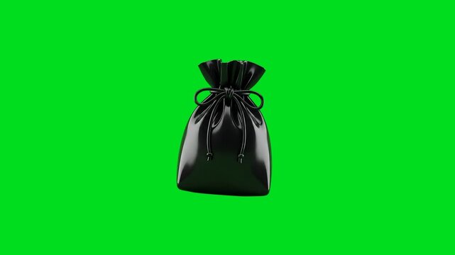 A sleek black drawstring pouch isolated against a vibrant green background