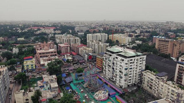 Aerial view of Patna, Bihar, India, showcasing the dense urban landscape, residential buildings, modern infrastructure, and busy roads of the city. Patna's rapid urban development