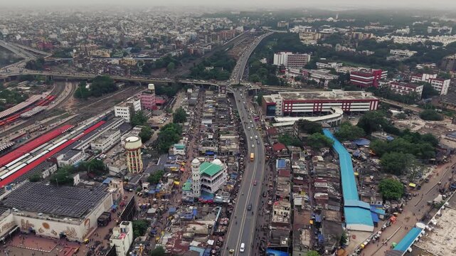 Aerial view of Patna, Bihar, India, showcasing the dense urban landscape, residential buildings, modern infrastructure, and busy roads of the city. Patna's rapid urban development
