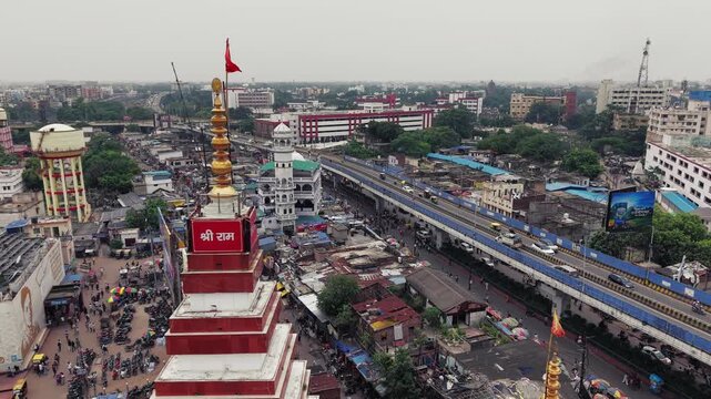 Aerial view of Patna, Bihar, India, showcasing the dense urban landscape, residential buildings, modern infrastructure, and busy roads of the city. Patna's rapid urban development