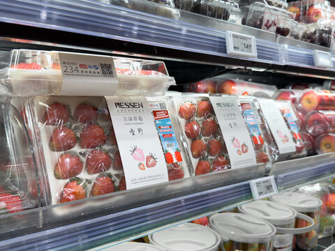 PENANG, MALAYSIA - MAY 25, 2026: Nessen fresh strawberries packaged and displayed in refrigerated supermarket produce section.