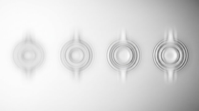 Four abstract concentric ripple patterns aligned horizontally on a clean, soft white backdrop.