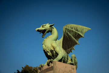 Fototapeta premium Ljubljana Dragon Statue Against Clear Blue Sky in Slovenia