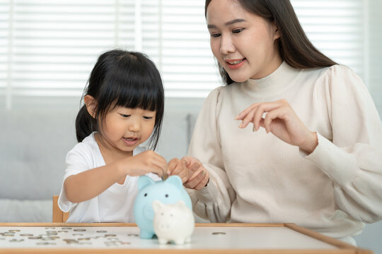 Save money. Mother teaching daughter for saving. wealth, Finance, insurance, investment, education, future, plan life, learn, banking, family, health, health and accident insurance.