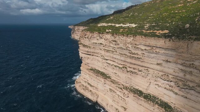 Aerial drone view of Dingli Cliffs on the western coast of Malta, 4K