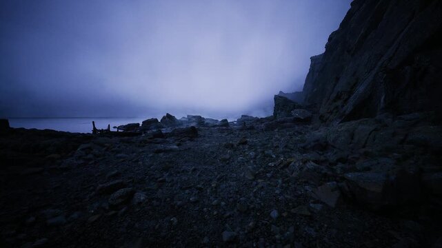 storm washed shore before pale dawn, foam and scattered pebbles across wet gravel, windblown chill and muted blue light create contemplative solitude