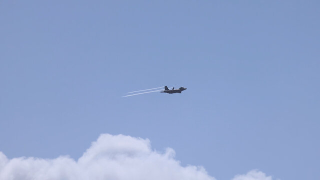 F-35A Lightning II Stealth Fighter Jet Flying Over Clouds