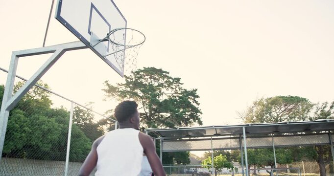 Black people, jump or basketball court for game or score in a challenge with teamwork or sports rival. Men, running dribble or outdoor workout exercise for athletes in fitness training or competition